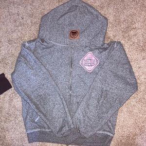 Grey zip up Muskoka hoodie girls XL.